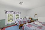 Twin bedroom 2 with two twin beds and central AC Vents